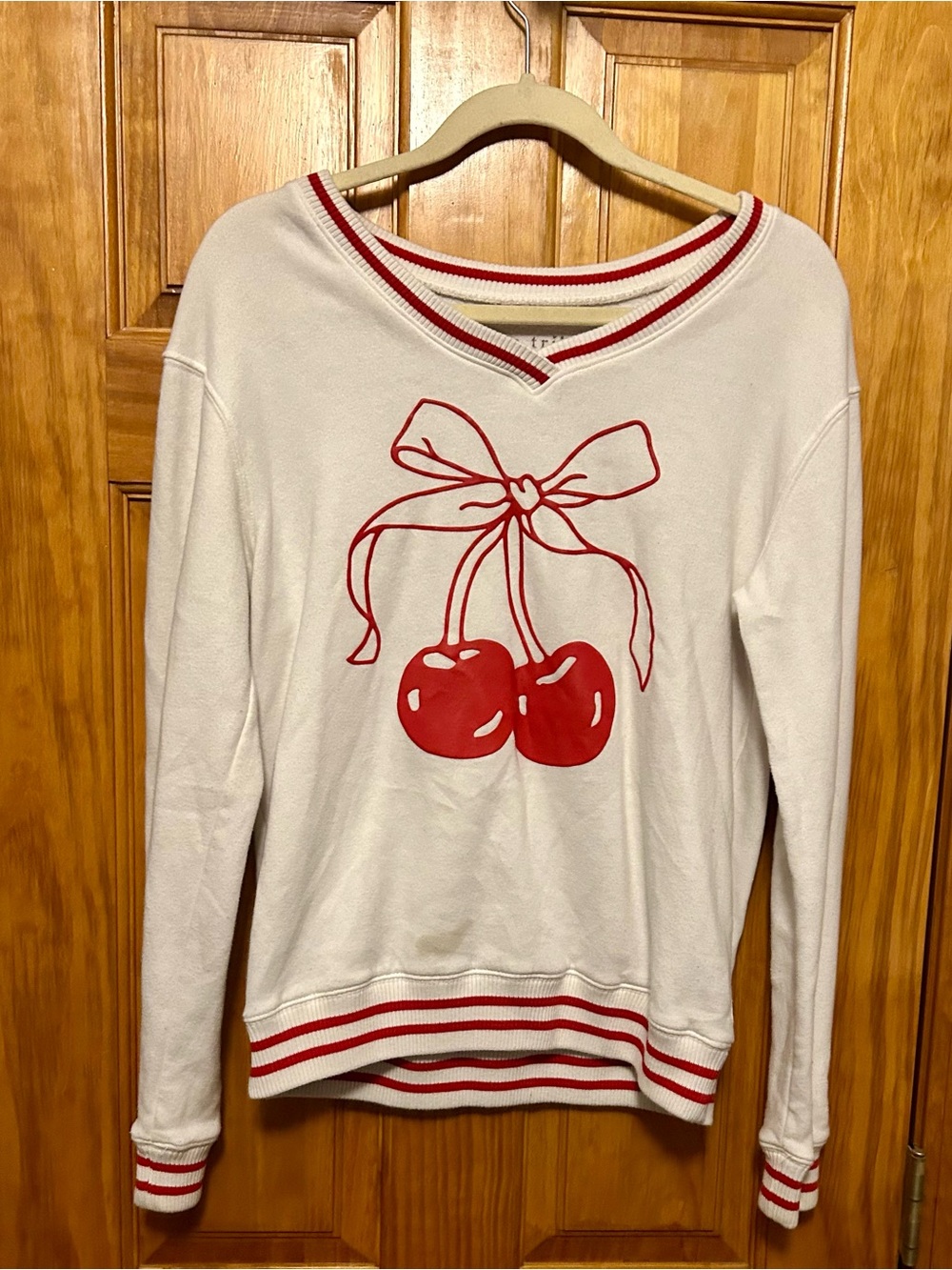 Cream V-Neck Sweater with Red Cherry Graphic